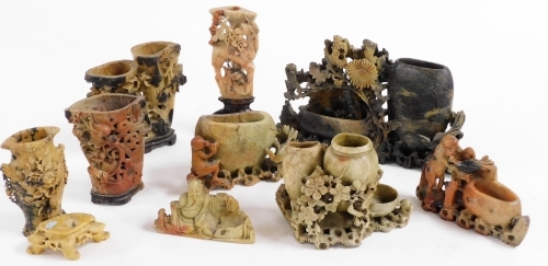 A group of Qing Dynasty soapstone brush washers, various carved with flowers, blossom, monkeys and figures. (a quantity, AF)