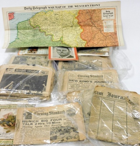 A quantity of early 20thC newspapers, to include the Grantham Journal, January 26th 1901, Evening Standard, January 28th 1936, reproduction Daily Telegraph war map, etc. (a quantity)