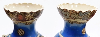 A pair of Japanese Meji period ovoid vases, with foliate rims and applied ring handles, with painted figures of Samurai on a sprayed blue and yellow ground, 54.5cm high. - 6