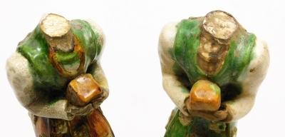 A pair of Chinese Tang style terracotta tomb figures, with brown, cream and green glazes, each holding a square parcel (AF), 38cm high. - 6