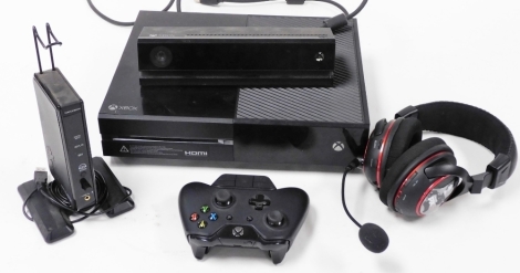 An Xbox One console, model 1540, SN102737134948, together with a camera, power unit, games controller, headphones and a Turtle Beech digit RF, Gear Force PX5.