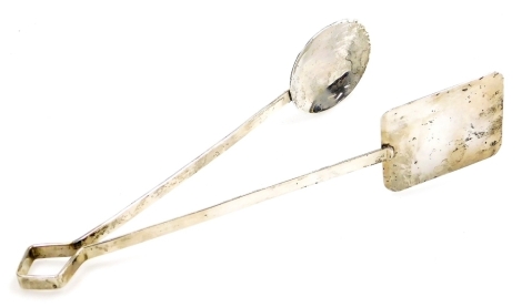 A pair of white metal serving tongs, of plain form, with an oval bowl and a rectangular plate, marked sterling 925 Mexico, 4oz, 26cm long.