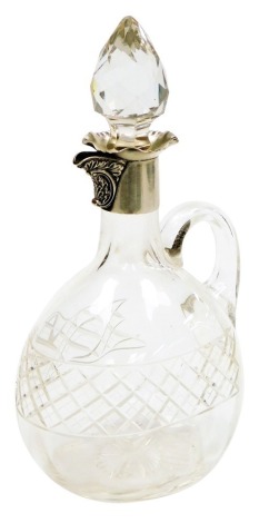 A late Victorian cut glass claret jug, with silver collar with flared rim and leaf and scroll decorated spout, with cut glass stopper, Sheffield 1900, 26cm high.