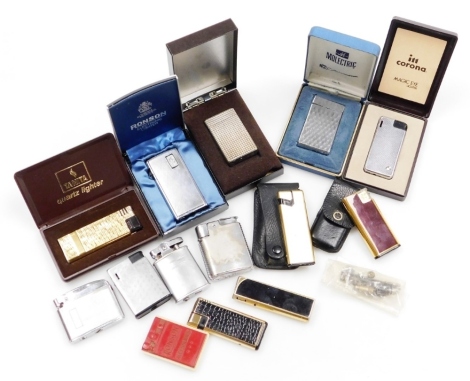 A group of cigarette lighters, to include Colibri lighter in gold coloured and black simulated crocodile skin leather case, Ronson steel lighter with engine turned decoration, a Ronson Varaflame electronic lighter, etc. (1 box)