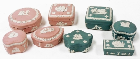 Wedgwood sage green and pink Jasper ware dressing table boxes and covers, each of classical decoration. (8)