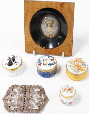 Continental School (20thC). A miniature portrait of a lady, together with a Middle Eastern belt buckle, white metal cast with replica coins, 9cm wide, four Halcyon Days and other enamel boxes. (6)