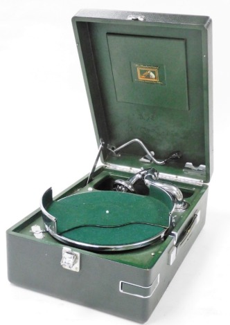 An HMV tabletop green cased gramophone, 59cm wide, 52cm deep.