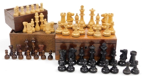 A Staunton type chess set, mahogany boxed, further chess set, wooden boxed, and an empty chess set box. (3)