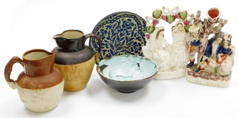 A group of ceramics, including a studio pottery bowl, Staffordshire flat back figure of two ladies under an arbor, and a Denby two tone stoneware jug with sprig moulding. (6)