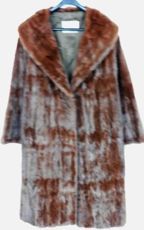 A fox full length fur coat, by L Marks, Furrier of Wolverhampton.