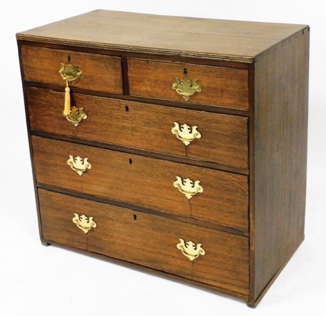 A George III style oak chest, of two short over three long graduated drawers, 88cm high, 95cm wide, 49.5cm deep.