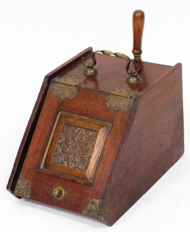 A Victorian oak and brass bound coal scuttle, with lead liner and shovel, 39cm deep.