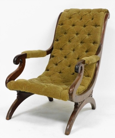 A Victorian mahogany and button back upholstered chair.