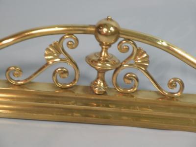 A late 19thC brass fender