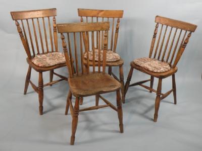 A set of four ash and elm spindle back kitchen chairs