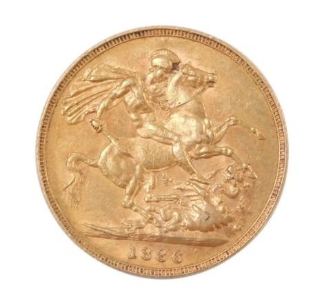 A Victoria young head full gold sovereign dated 1886.