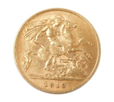 A George V half gold sovereign dated 1913.