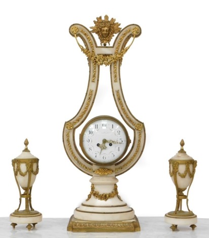 A late 19th French porcelain ormolu and gilt metal lyre clock garniture de cheminee, by Sartinot of Paris, the alabaster shaped frame holding a barrel dial with enamel, eight day movement and striking a bell, with pendulum and each garniture vase having a