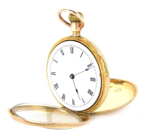 A Continental fob watch, with white ceramic Roman numeric dial, and bezel wind, with floral engraved case, yellow metal stamped 10c, 42.5g all in.