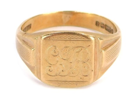 A 9ct gold gent's signet ring, with rectangular set ring head, bearing initials GJR, with engraved sides, size V, 6.3g all in.