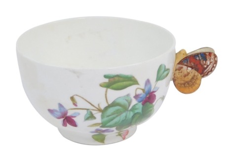 An early 20thC Royal Doulton teacup, with butterfly handle and hand painted pansy decoration , with brown triangle RD stamped to underside, 11cm diameter, 7cm high.