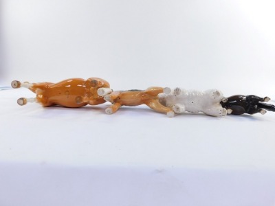 Four Beswick animal ornaments, comprising a tan horse, 22cm high, a white Scotty dog, 12cm high, a brown horse, 12cm high, and a brown and black terrier, 15cm high. (4) - 2