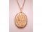 A large engraved oval locket on a fine belcher chain