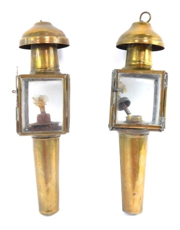 A pair of brass carriage lanterns, each with square set top, 23cm high.