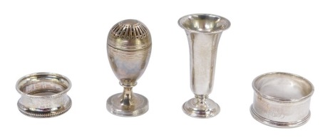 Four items of silver wares, comprising a small silver napkin ring, inverted bearing the initial H with beaded border, a further napkin ring bearing the initial CFH, with beaded border, a Victorian silver domed topped perfume pot and a silver bud vase, 3½o