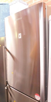 A Blomberg stainless steel freestanding tall fridge freezer.