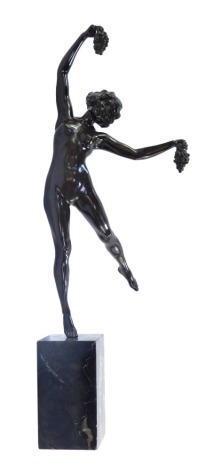 Bronze statue (French School circa 1920). A bronze figure of a lady carrying bunch of grapes, on a black marble base, 60cm high.