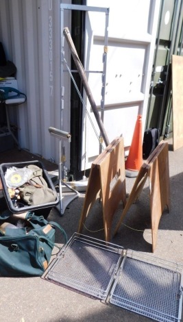 A group of workshop accessories, comprising pair of wooden trestles, a metal rollers, bargate box, a bag of loose wood off cuts, etc. (a quantity)