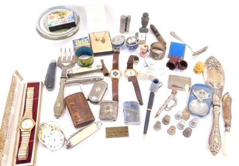 Curios and trinkets, comprising egg clock, wristwatches, silver plated thimbles, mother of pearl handled penknives, miniature treen box, silver plated vesta cases, Avia wristwatch, etc. (a quantity)