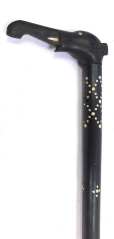 An African ebony and mother of pearl inlaid walking stick, with elephant handle and spotted body, 91cm long.