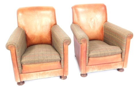 A pair of vintage armchairs, each with tartan fabric arms and a tan leather seat and back, 82cm high, 62cm wide, 66cm deep.