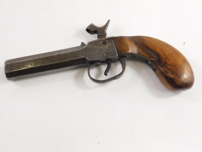 A 19thC percussion boxlock pistol, with plain barrel and walnut handle, 19cm long. - 2