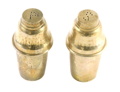 A novelty silver plated cruet set, Culinary Concepts, comprising salt and pepper pots formed as cocktail shakers, 9cm high, marked beneath. (2)