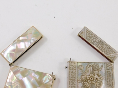 A Victorian mother of pearl card case, the rectangular body raised with flowers, with further floral and scroll panels, 11cm high, and a further mother of pearl card case with a diamond arrangement. (2) - 3