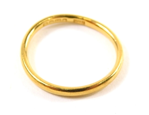 A 22ct gold wedding band, size N, 2.7g.