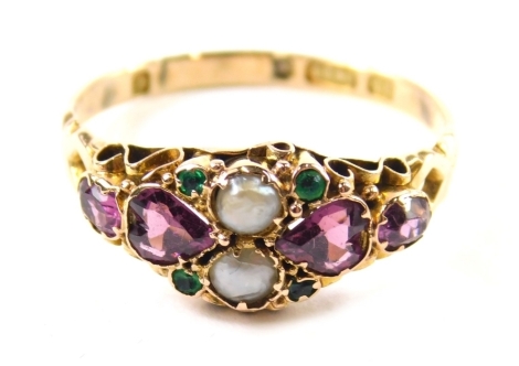 A Victorian 15ct gold ring, set with two pearls, small green and purple stones, size O, 1.5g all in. (cased)