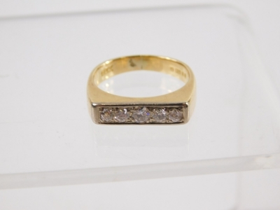 An 18ct gold five stone diamond dress ring, angular setting, size N, 6.3g all in. - 2