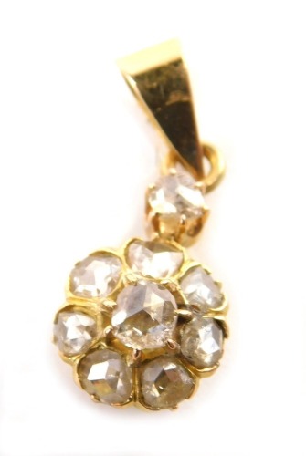 A seven stone diamond floral drop pendant, round brilliant cut, 0.5cts, on gold backing, VS-2 clarity, colour H, 2cm high, approx 1.9g all in, boxed with paperwork.