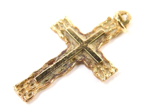 A 9ct gold cross pendant, of textured form, plain hook top, 3cm high, 1.7g.