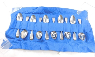 Ten various Victorian silver dessert spoons, fiddle pattern, each with H initial engraved to handle, different makers and dates, London assay, 14¼oz.