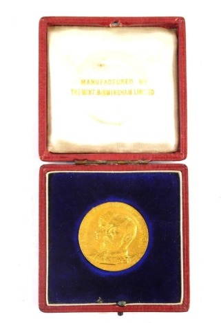 A George V commemorative medallion, Royal Visit to Bristol 28th June 1912, to open the King Edward VII memorial infirmary, unmarked yellow metal, in fitted case.