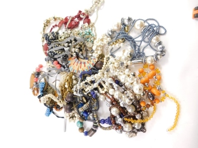 A group of modern costume jewellery necklaces, of varying designs and period styles, mainly beaded and chunky examples. (a quantity)