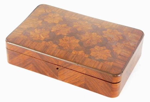 A 19thC French kingwood and parquetry inlaid card box, set with a snowflake inlay to the lid, 21cm wide, with fitted interior.