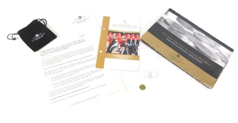 A London Mint limited edition 2012 Diamond Jubilee 9ct gold proof coin, 16mm diameter, with paperwork.