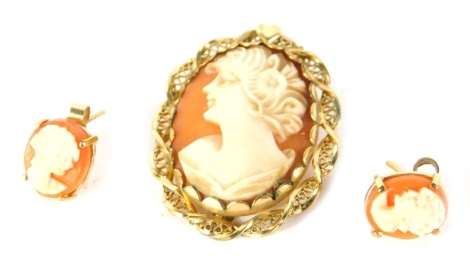 A cameo jewellery set, comprising brooch set with lady quarter profile, 3cm high, and two ear studs, unmarked. (3)