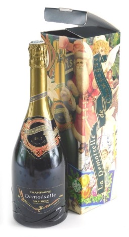 A bottle of Demoiselle Vranken champagne, boxed.